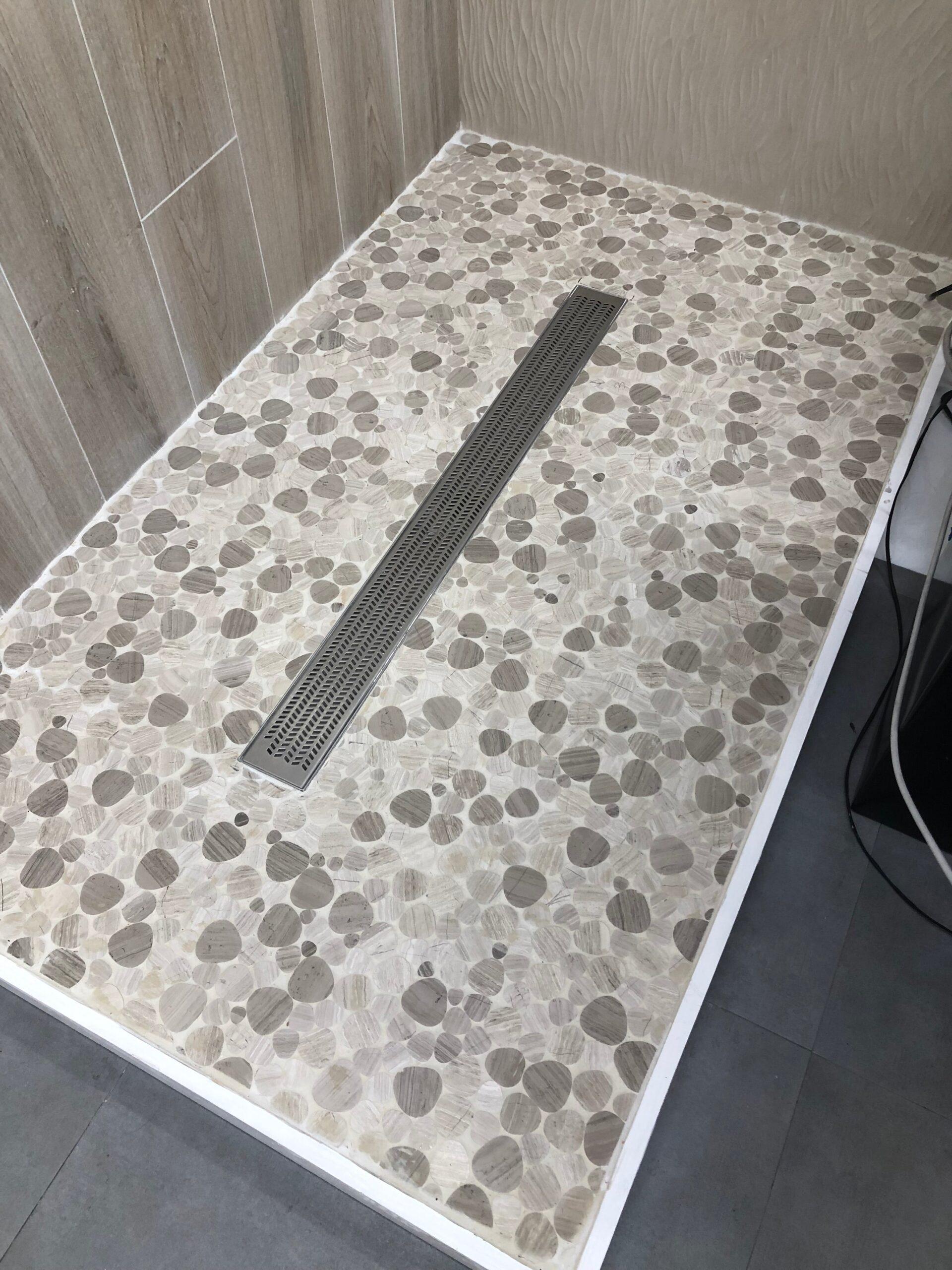 heart shaped tiles on shower floor